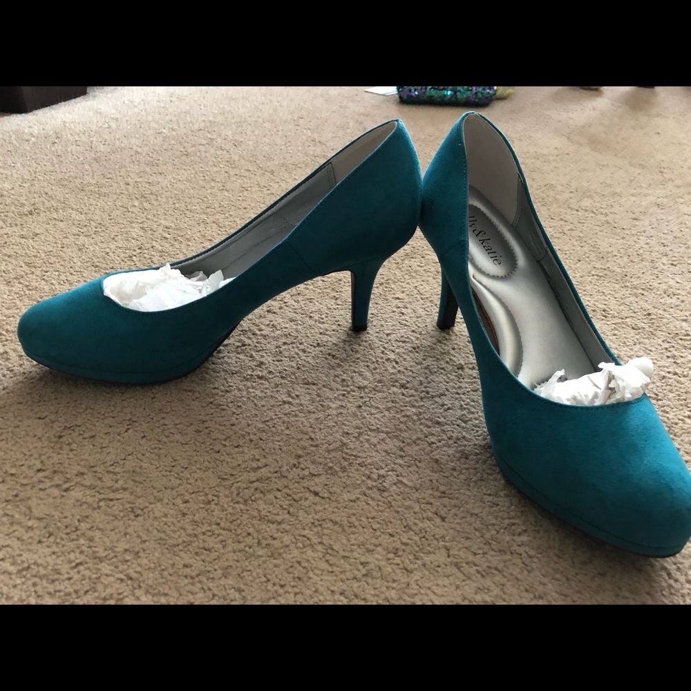 Teal suede pumps